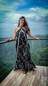 “AMAPOLA” PRINTED HALTER NECK WIDE LEG JUMPSUIT